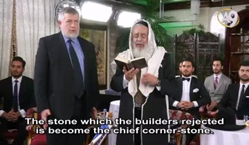Rabbi Mr. Mordékhai Chriqui is reading from the To