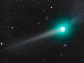 A double-tailed comet and natural phenomena to be 